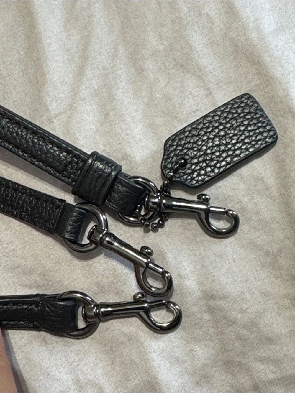 Coach pebble leather strap , wristlet strap & hangtag